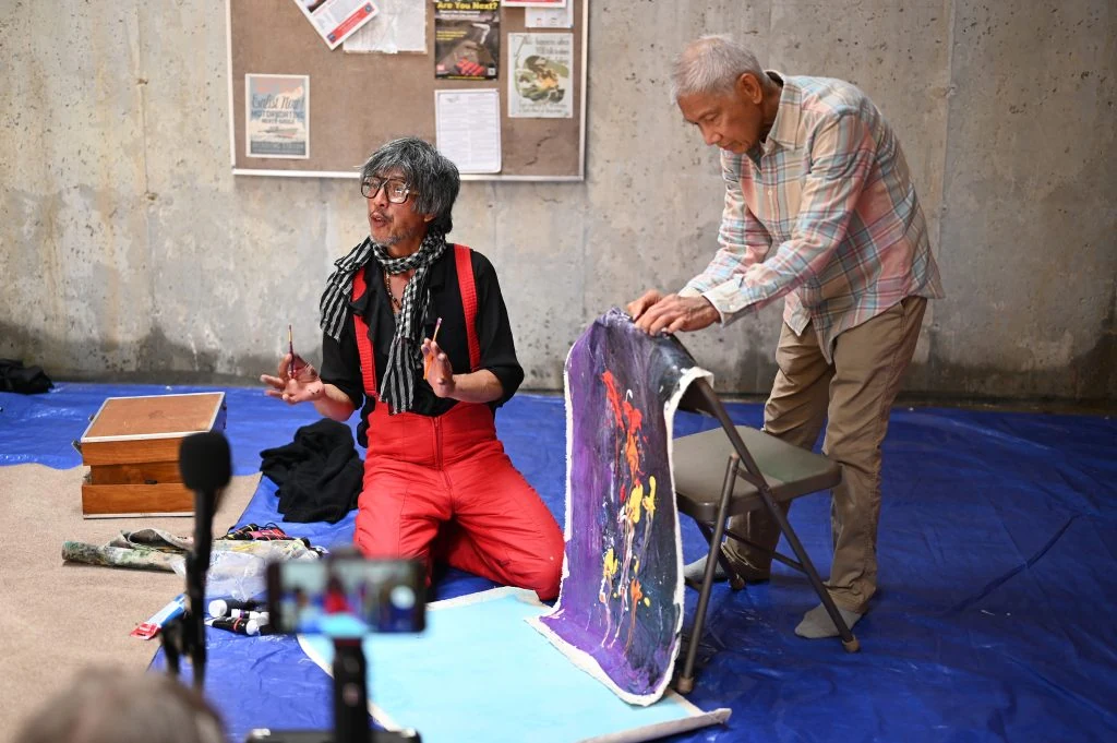 Artist Raghunath demonstrating abstract painting during the RAWA programme in Connecticut, USA